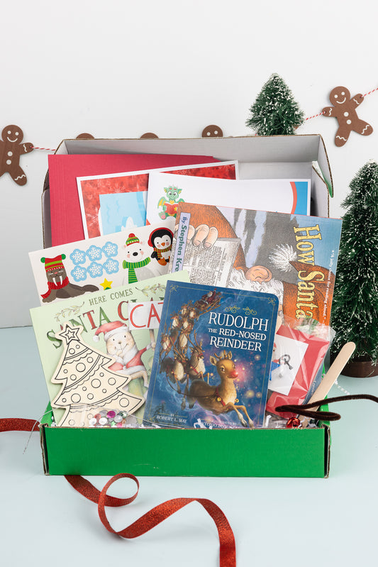 holly jolly reading activity box with Christmas books and crafts from Lil Readers Book Club