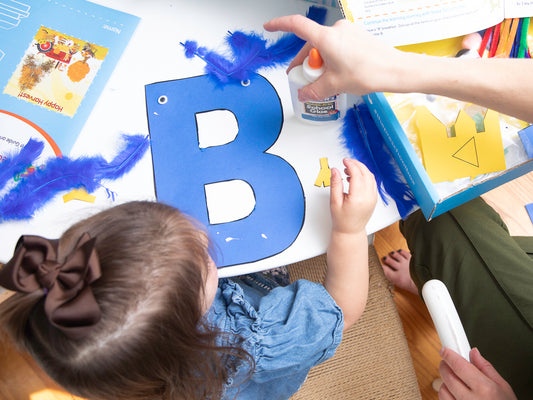 Child working letter B project from The Preschool Box